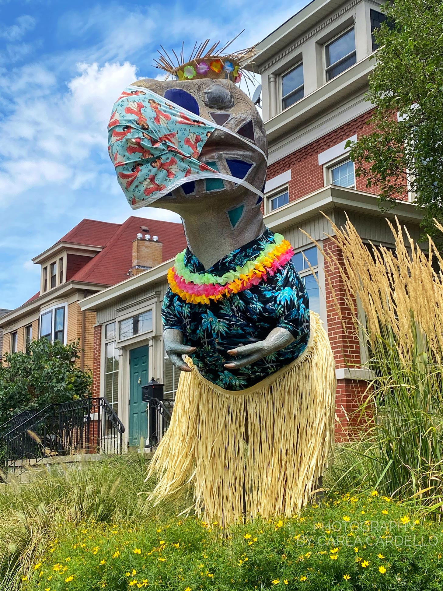 Lunasaurus Lux Pittsburgh Dinosaur Statue in Hawaiian shirt