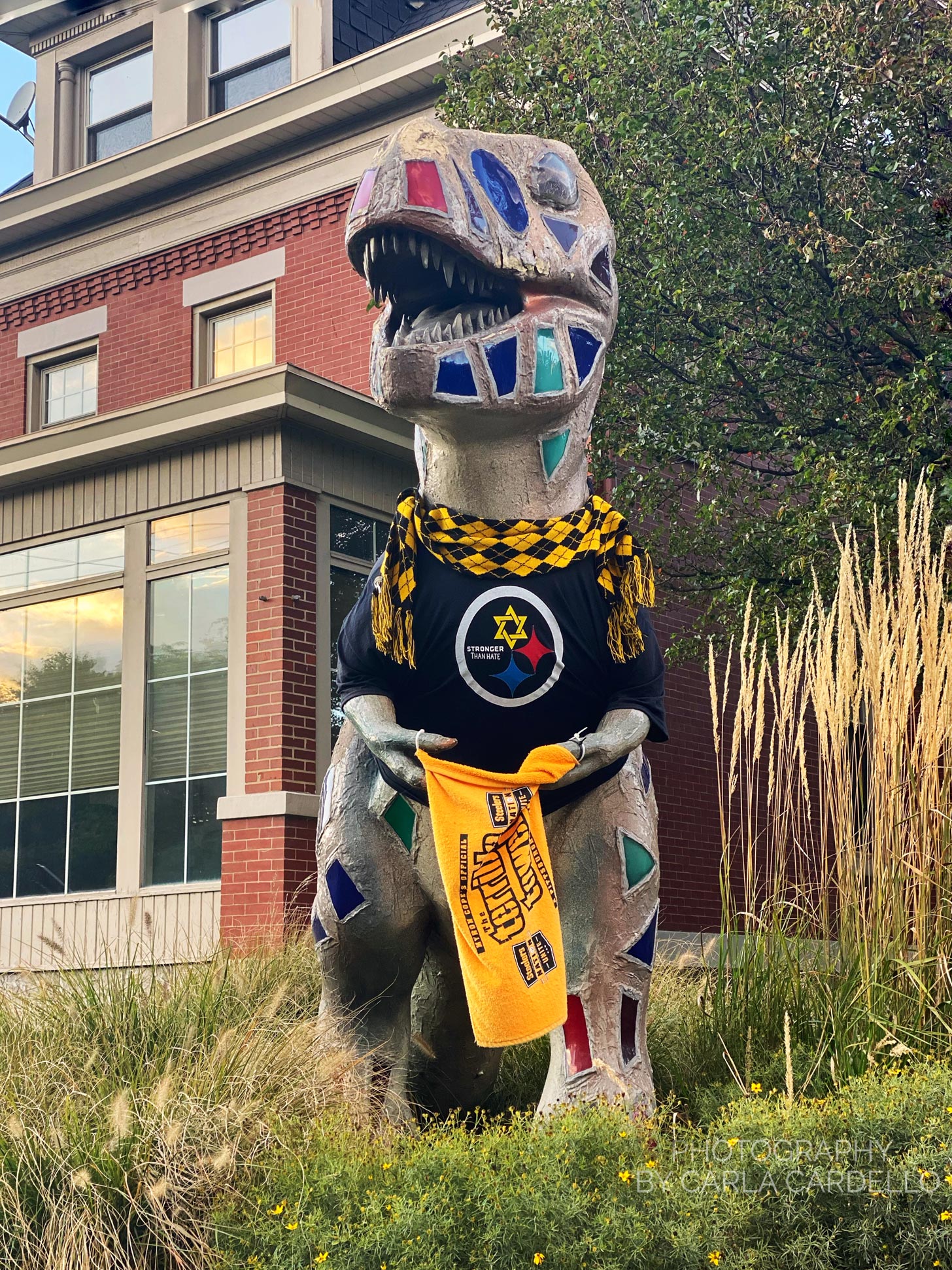 Lunasaurus Lux Pittsburgh Dinosaur Statue in Steelers gear