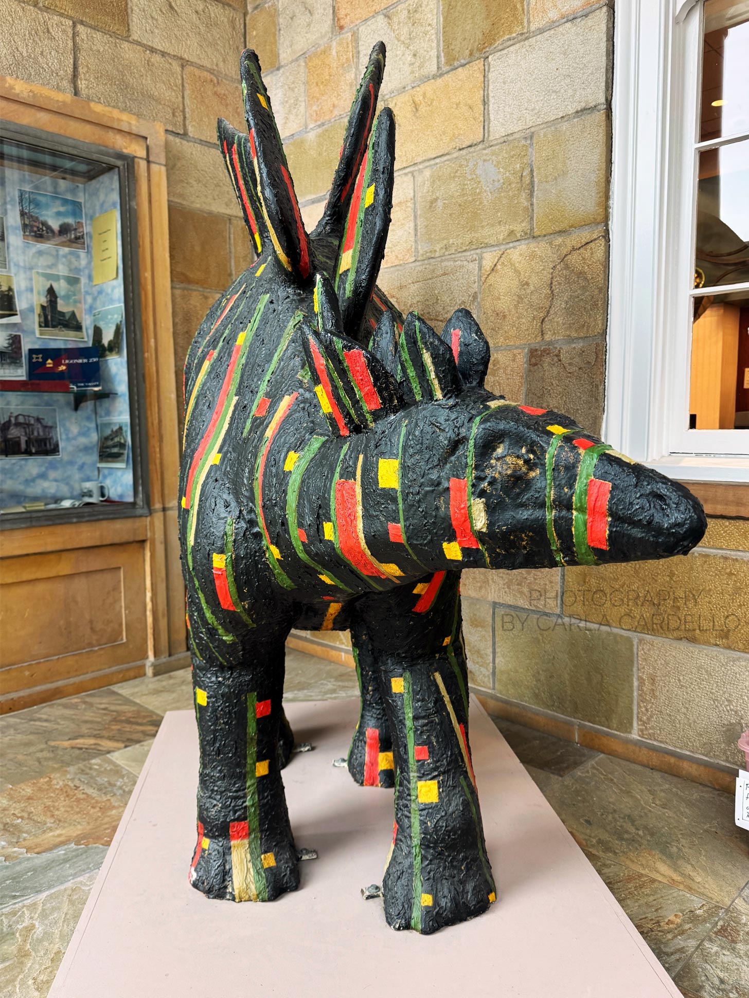 Side view of Pixelsaurus Pittsburgh Dinosaur Statue